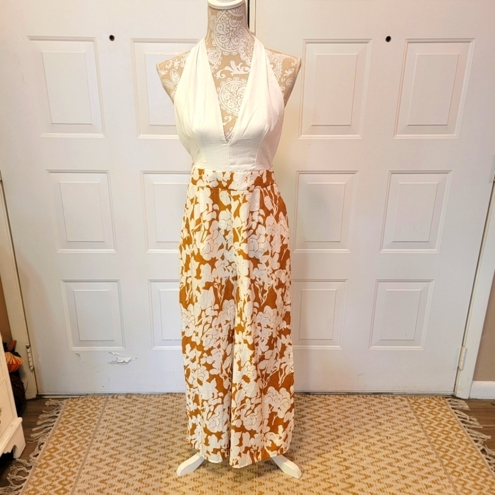 NWT‎ Follow Me white halter printed wide leg bottom backless jumpsuit w/ pockets